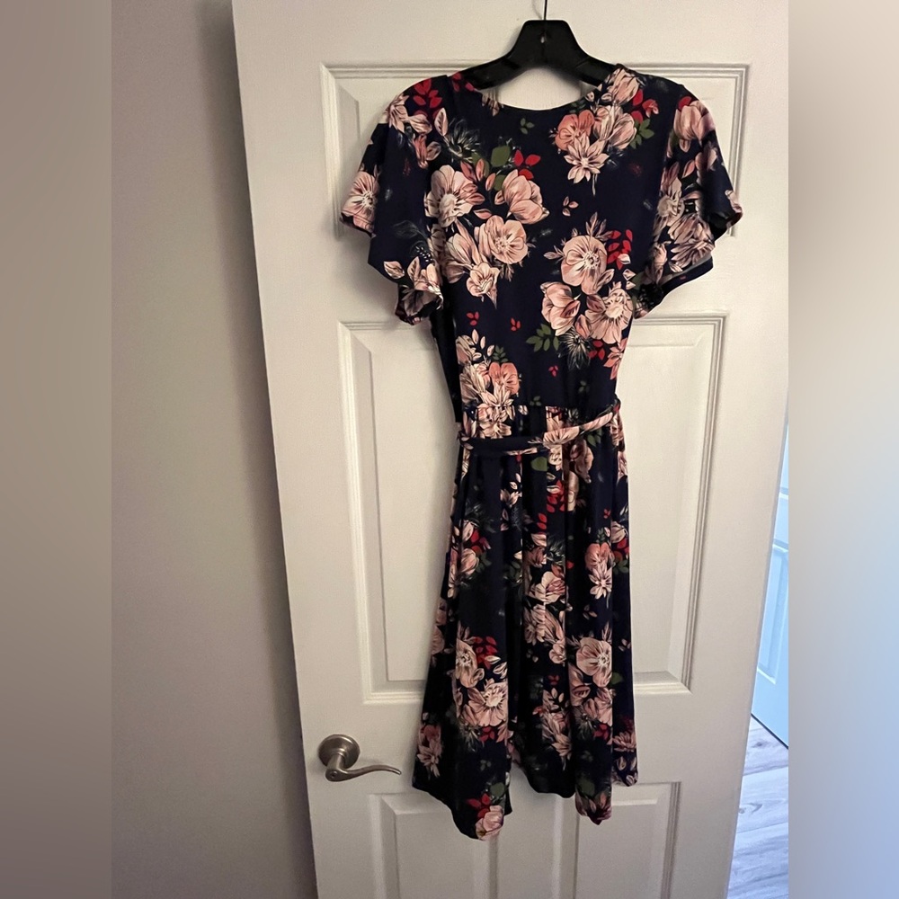 Mai Soli dress   Pretty navy floral print with flattering wrap front.